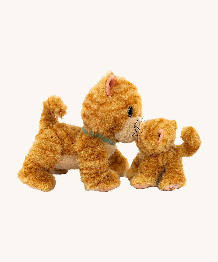 Olli Ella binx cat dinkum doll and koda the binky kitten kissing. Both of these toy dolls are available at Babipur.