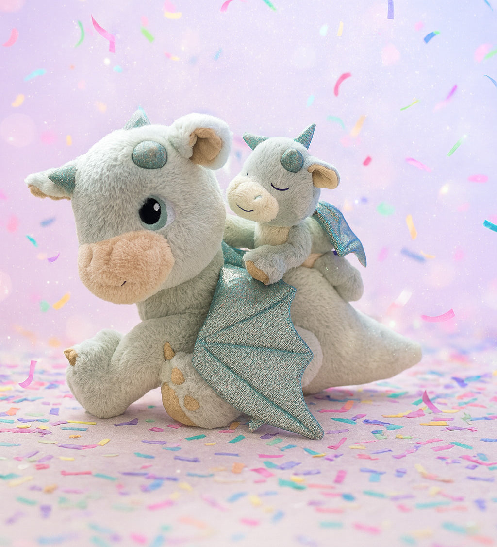 A Olli Ella blaze dinkum dragon doll with a volt dinkum on its back. These two dragons are available at Babipur.