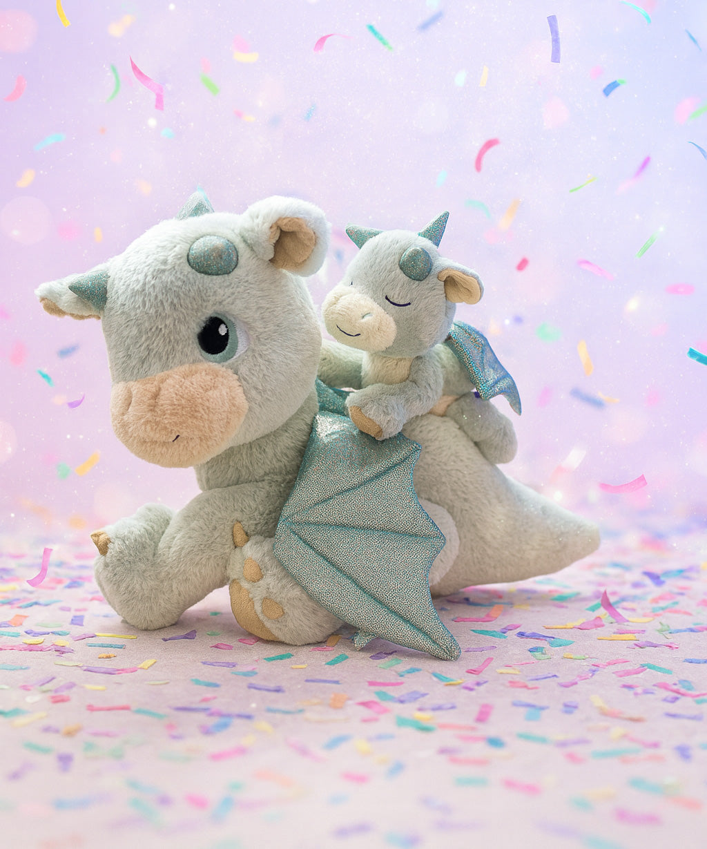 A Olli Ella blaze dinkum dragon doll with a volt dinkum on its back. These two dragons are available at Babipur.