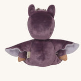 A view of the back of the purple coloured Olli Ella Bowie bat dinky dinkum doll soft toy. The dinky has lilac coloured inner wings and ears that glow in the dark. These soft toys are part of Olli Ella's Halloween collection available here at Babipur.
