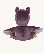 A view of the back of the purple coloured Olli Ella Bowie bat dinky dinkum doll soft toy. The dinky has lilac coloured inner wings and ears that glow in the dark. These soft toys are part of Olli Ella's Halloween collection available here at Babipur.