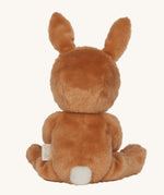 Olli Ella toffee coloured Bucky Bunny Dinky Dinkum Doll in a seated position facing away from the camera. The back of the bunny can be seen with a white fluffy tail.