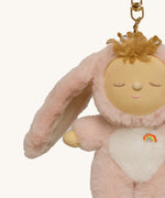 A close up of the Olli Ella bunny flopsy cozy bag charm available at Babipur showing the floppy ears and cute facial features