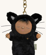 A close up of the Olli Ella cat nox cozy bag charm available at Babipur showing the cats whiskers and clip detail on the charm