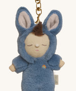 A close up of the Olli Ella bunny twiggy cozy bag charm available at Babipur showing the charm's cute facial features and clip attached to the charm to clip on a backpack