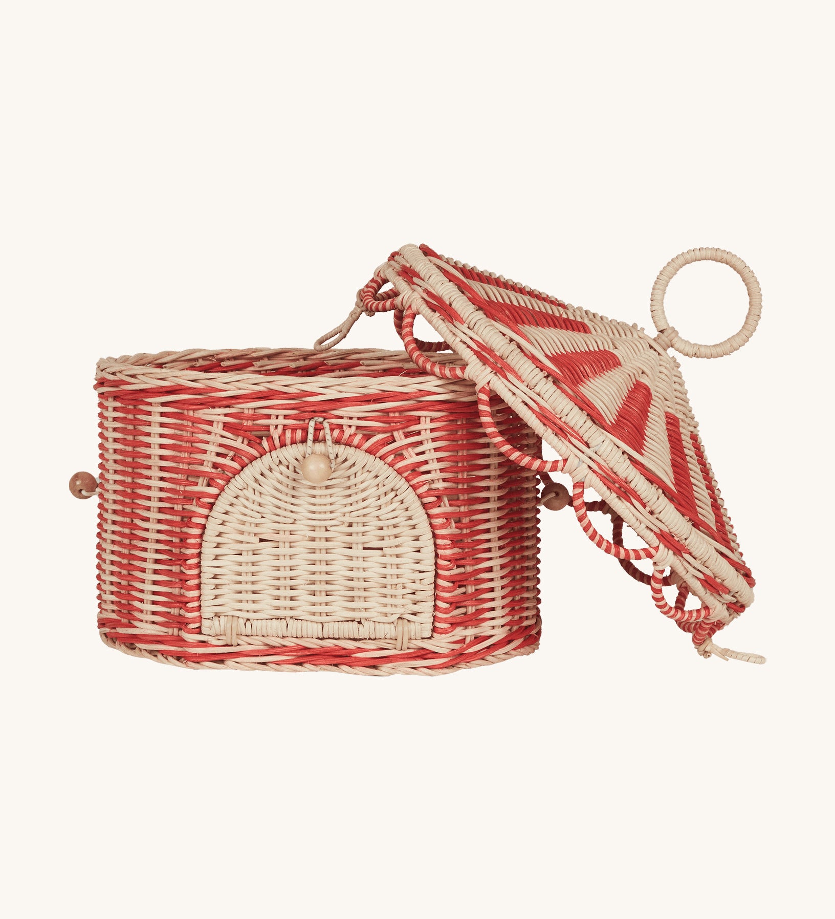Olli Ella red and white rattan basket in a shape of a circus tent available at Babipur. Features a removable lid and a front door that opens.