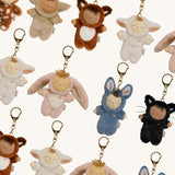 A group of Olli Ella cozy bag charms available at Babipur including Bunny Flopsy, Bunny Twiggy, Cat Nox, Fawn Lala, Fox Finnley, Lamby Pip, Lamby Pookie