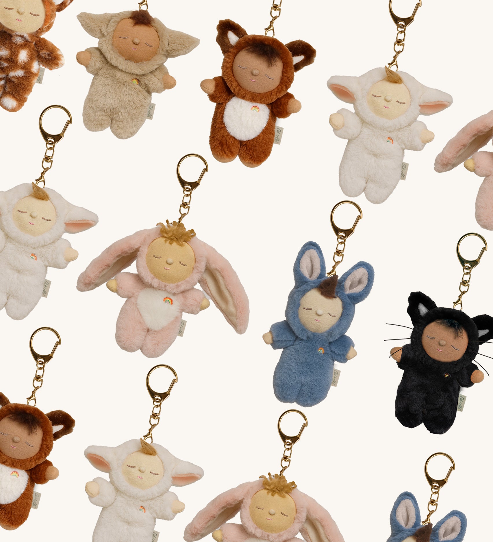 A group of Olli Ella cozy bag charms available at Babipur including Bunny Flopsy, Bunny Twiggy, Cat Nox, Fawn Lala, Fox Finnley, Lamby Pip, Lamby Pookie