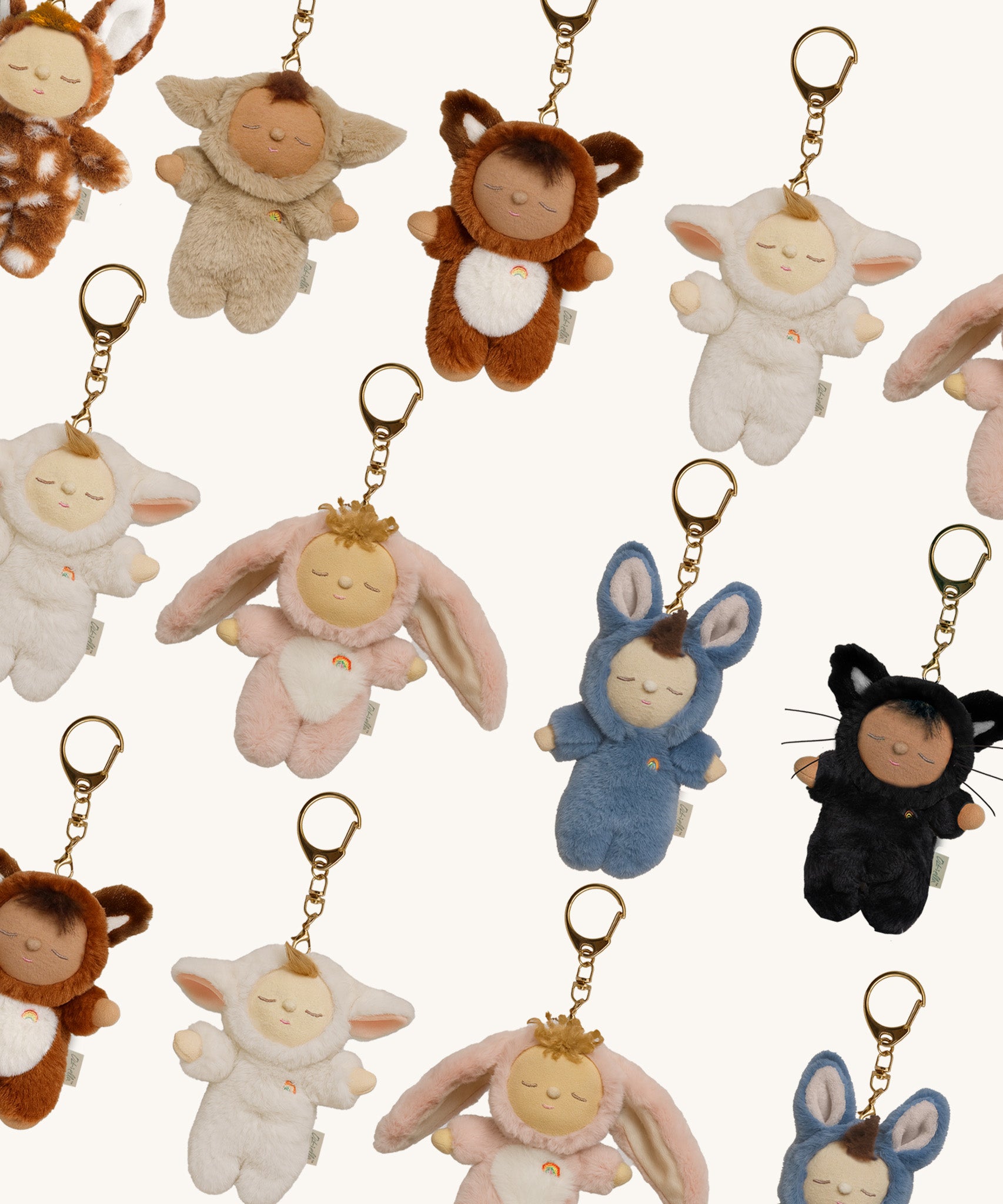 A group of Olli Ella cozy bag charms available at Babipur including Bunny Flopsy, Bunny Twiggy, Cat Nox, Fawn Lala, Fox Finnley, Lamby Pip, Lamby Pookie