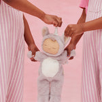 2 children holding a lilac fluffy unicorn Olli Ella dozy dinkum doll 