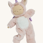 A posing pink fulffy Olli Ella unicorn dinkum doll on a cream background