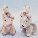 A picture of the dinkum unicorns, with the baby unicorns sat on their heads, with a blue background