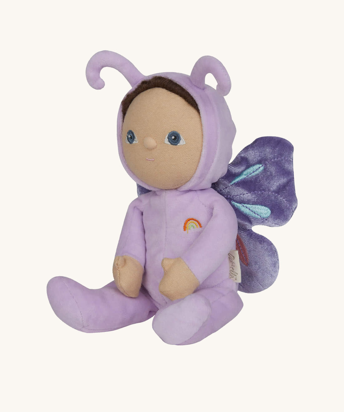 The Olli Ella Dinky Dinkum Doll - Betty Butterfly - in a light purple onesie, with brown hair, blue eyes, dark purple butterfly wings, and antennae.