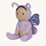 The Olli Ella Dinky Dinkum Doll - Betty Butterfly - in a light purple onesie, with brown hair, blue eyes, dark purple butterfly wings, and antennae.