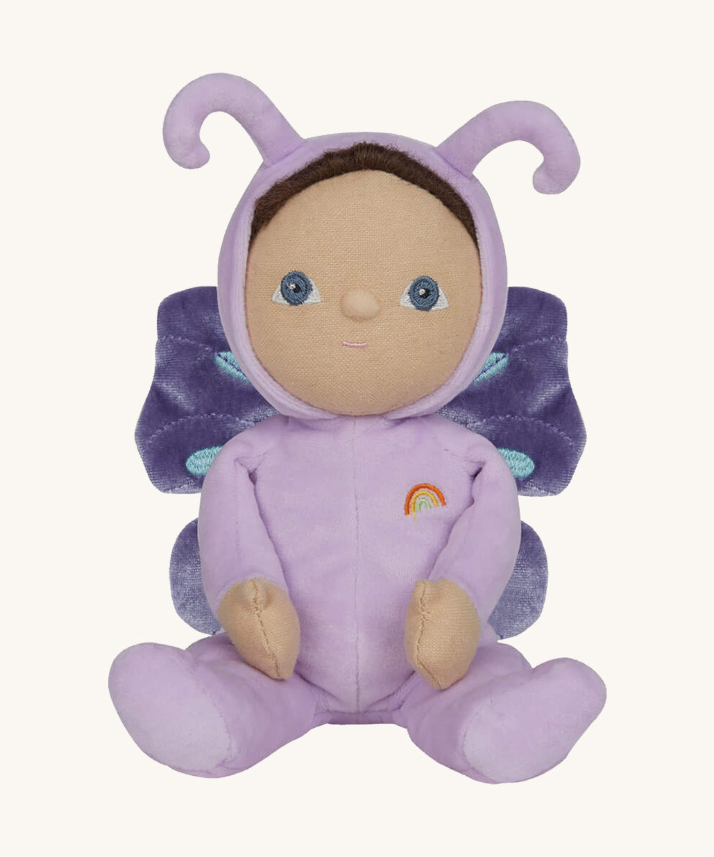 The Olli Ella Dinky Dinkum Doll - Betty Butterfly - in a light purple onesie, with brown hair, blue eyes, dark purple butterfly wings, and antennae.