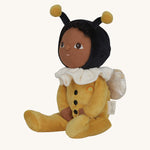 The Olli Ella Dinky Dinkum Doll - Billie Bumblebee - in a yellow onesie with a black hood and antennae, with a white ruffled collar, brown eyes, and buzzy bee wings.