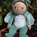 The Olli Ella Dinky Dinkum Doll - Gideon Grasshopper - in a green onesie, with dark brown hair, dark green eyes, grasshopper wings, and antennae.