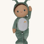 The Olli Ella Dinky Dinkum Doll - Gideon Grasshopper - in a green onesie, with dark brown hair, dark green eyes, grasshopper wings, and antennae.