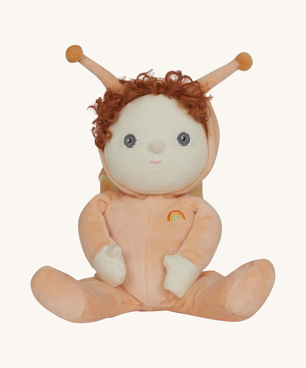 The Olli Ella Dinky Dinkum Doll - Scottie Snail - in a soft light orange onesie with curly red hair, a snail shell on his back, and antennae.