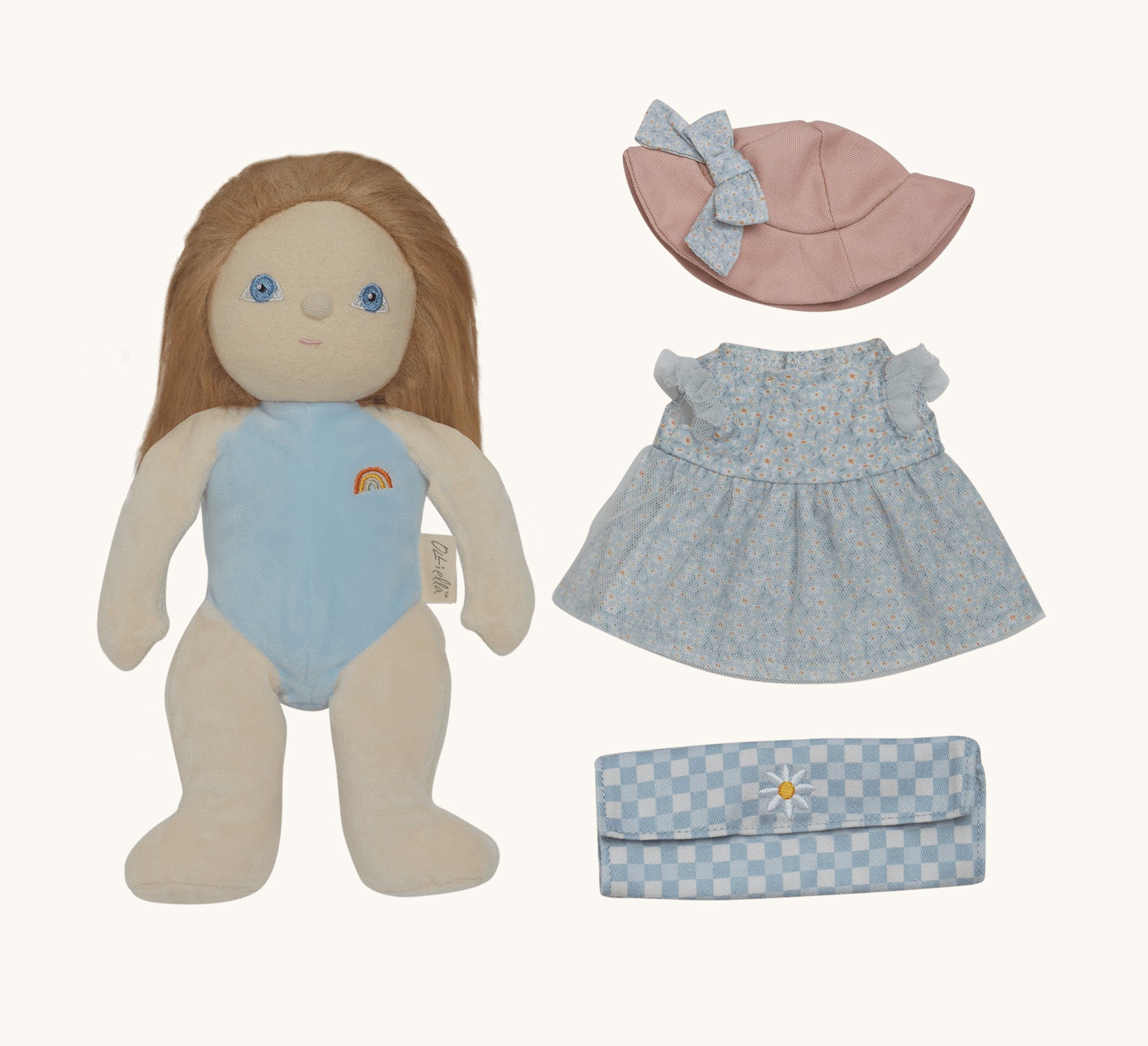 Olli Ella Penelope Petals Dress Me Dinky Dinkum Doll with removable outfit laid out, including blue floral dress, pink hat, and gingham picnic blanket.