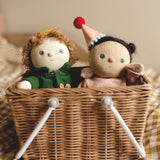Two Olli Ella Dress Me Dinky's in a woven basket.