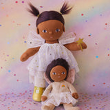 Olli Ella Freya dream dinkum doll sitting next to Faye dinky dinkum doll against a dreamy background with confetti on the floor