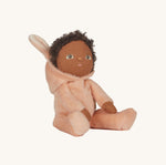 stood on a long bench chair carrying the Olli Ella Dinky Dinkum Doll Fluffles collection