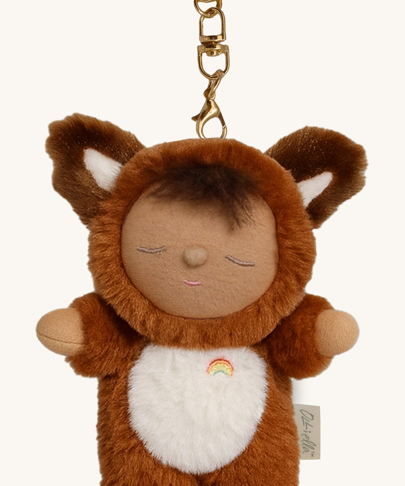 A close up of the Olli Ella fox finley cozy bag charm available at Babipur showing the clip detail on the charm for clipping on a bag