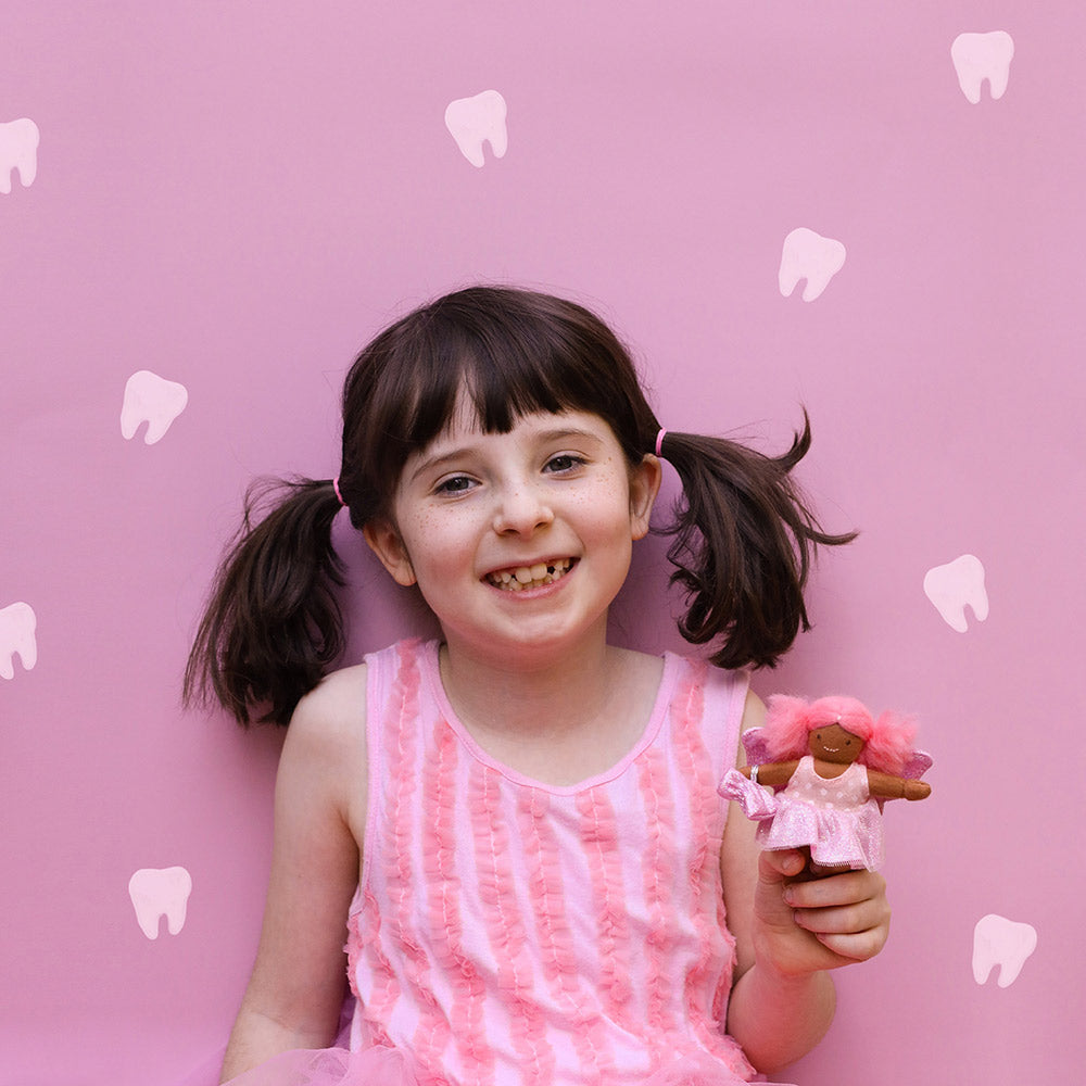 Tulip and Willow on a purple tulle material held by a child