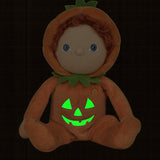 An Olli Ella Jack-O-Lantern pumpkin dinky dinkum doll. The soft doll has a glow in the dark face on it's belly. These soft toys are part of Olli Ella's Halloween collection available here at Babipur.