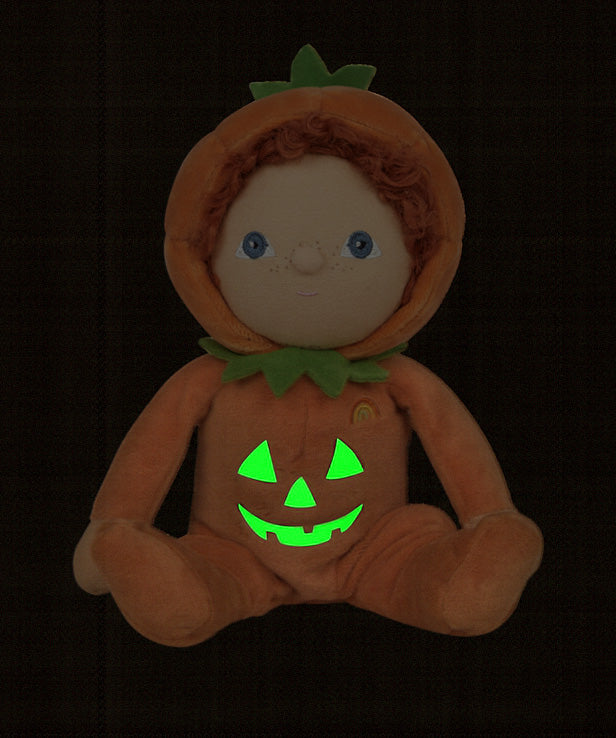 An Olli Ella Jack-O-Lantern pumpkin dinky dinkum doll. The soft doll has a glow in the dark face on it's belly. These soft toys are part of Olli Ella's Halloween collection available here at Babipur.
