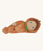 An Olli Ella Jack-O-Lantern pumpkin dinky dinkum doll. The soft doll has a glow in the dark face on it's belly and a small embroidered rainbow detail on it's chest. These soft toys are part of Olli Ella's Halloween collection available here at Babipur.