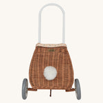Olli Ella Rattan Bunny Luggy with Lining – Gumdrop and Pansy on a colourful chequed blanket