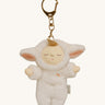 Olli Ella lamby pookie cozy bag charm available at Babipur. A mini version of pookie the lamby dinkum doll that can be clipped on a bag