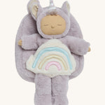 The Olli Ella lilac fluffy backpack with a dozy dinkum doll sitting 