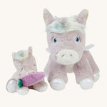 The baby unicorn toy next to the bigger dinkum unicorn toy