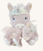 The dinkum unicorn is holding the baby unicorn with its magnetic mouth