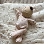 and a non-removable ballet pink soft velvet onesie with golden embroidered stars.