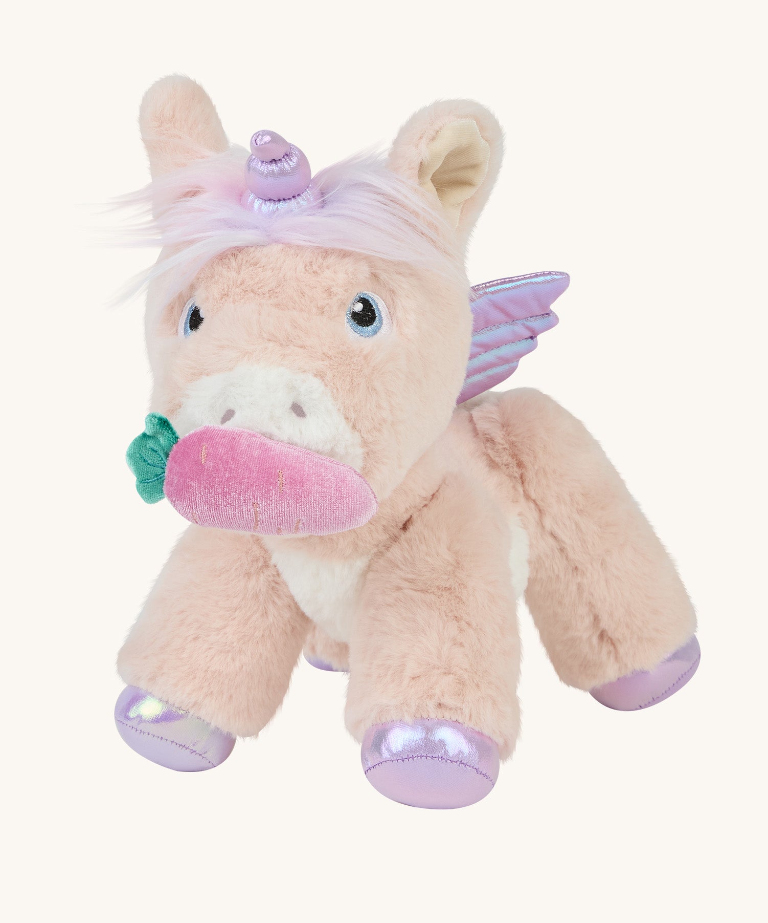 The magnetic carrot toy is attached to the unicorn's magnetic mouth, making it look as if the unicorn is eating