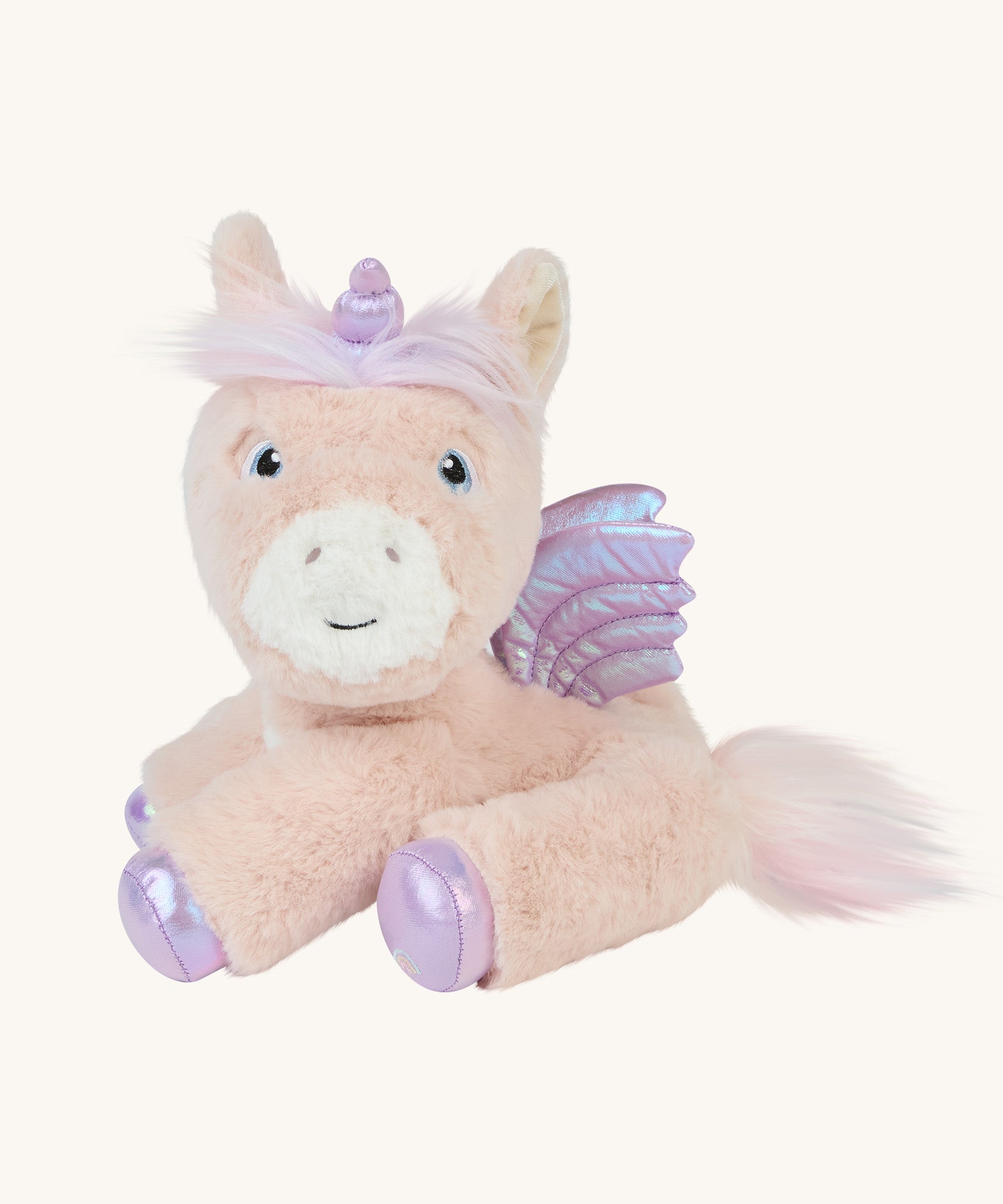 The unicorn is positioned in a sitting position