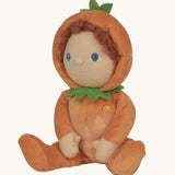 An Olli Ella Jack-O-Lantern pumpkin dinky dinkum doll. The soft doll has a glow in the dark face on it's belly and a small embroidered rainbow detail on it's chest. These soft toys are part of Olli Ella's Halloween collection available here at Babipur.