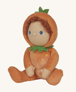 An Olli Ella Jack-O-Lantern pumpkin dinky dinkum doll. The soft doll has a glow in the dark face on it's belly and a small embroidered rainbow detail on it's chest. These soft toys are part of Olli Ella's Halloween collection available here at Babipur.