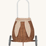 Olli Ella Rattan Bunny Luggy with Lining – Gumdrop. A beautifully woven Luggy roll along basket with a light peach lining and gum drop detail.