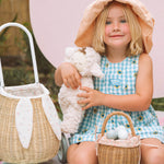 A child happily playing an egg hunt