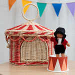 A child holding the Olli Ella Holdie Circus Folk Ronaldo The Ringleader in their hands