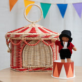 A child holding the Olli Ella Holdie Circus Folk Ronaldo The Ringleader in their hands