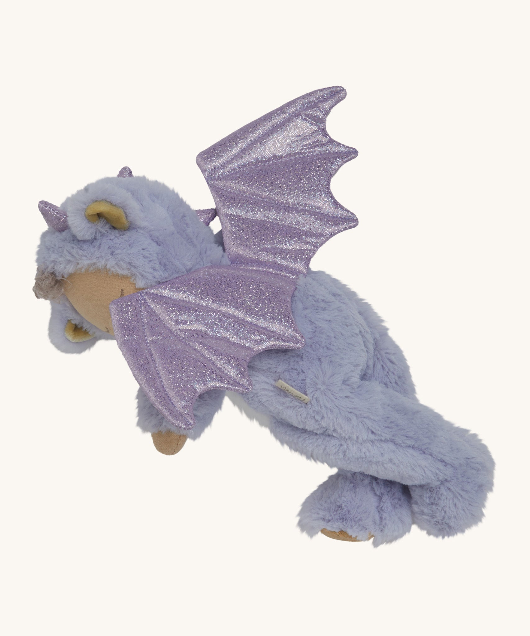 Olli Ella Rory cozy dinkum doll posing and showing the the sparkling lilac dragon wings detail.