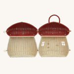 The Olli Ella Rattan Woven mushroom doll's house, with a red spotty toadstool top, opened all the way to show the inside.