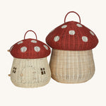 The Olli Ella Rattan Woven mushroom doll's house, with a red spotty toadstool top, next to the large toadstool woven basket in the same colour.