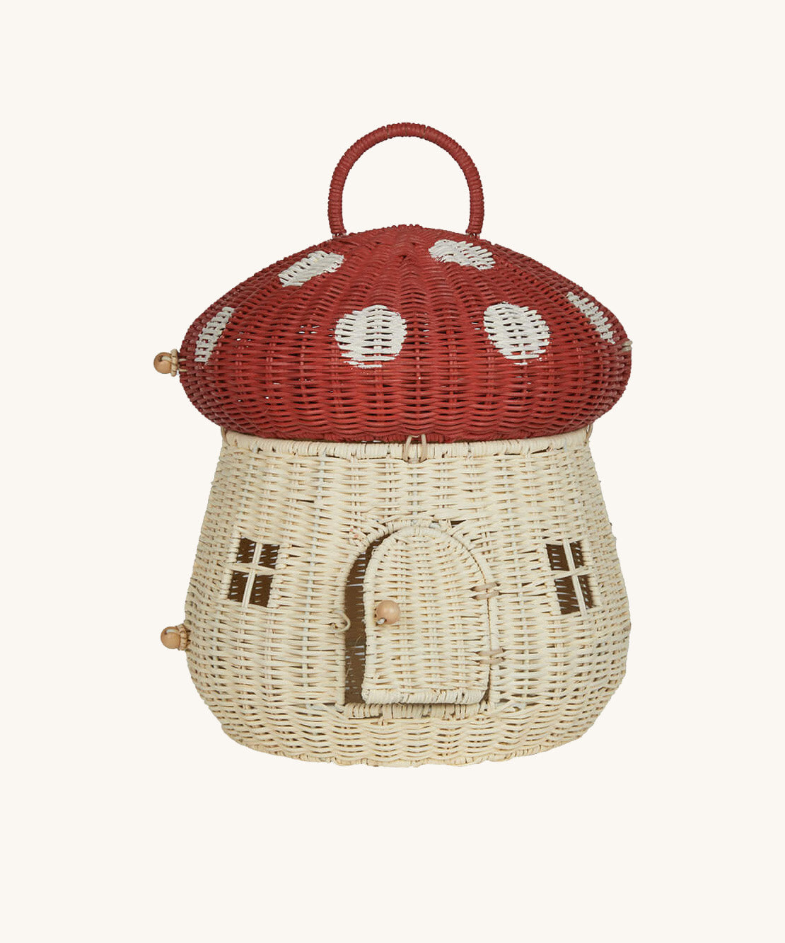 The Olli Ella Rattan Woven mushroom doll's house, with a red spotty toadstool top and an opening door.